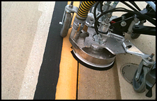 The marking is completely removed and the surface is left clean and dry.